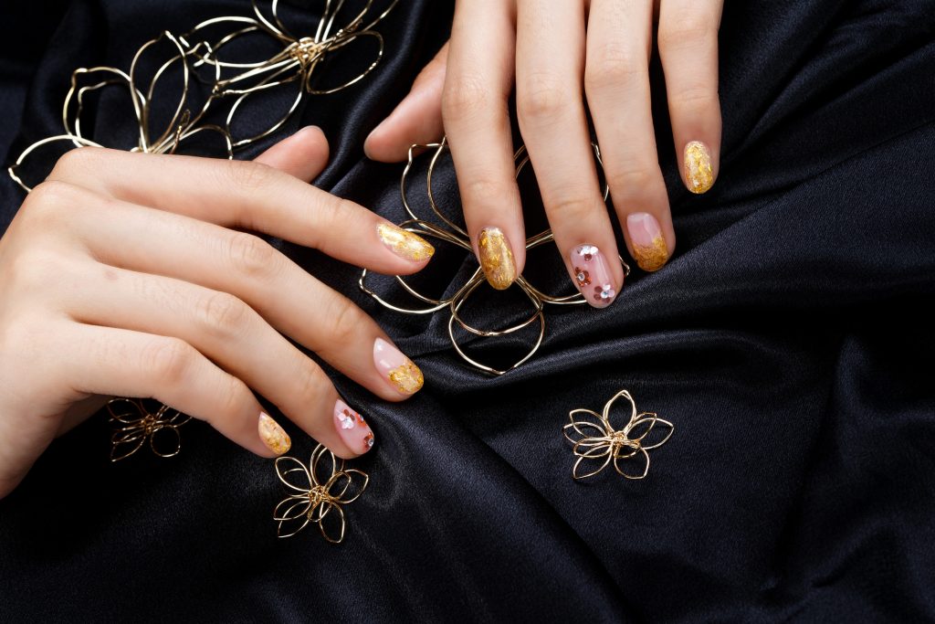 a woman's nail, designed with nail art